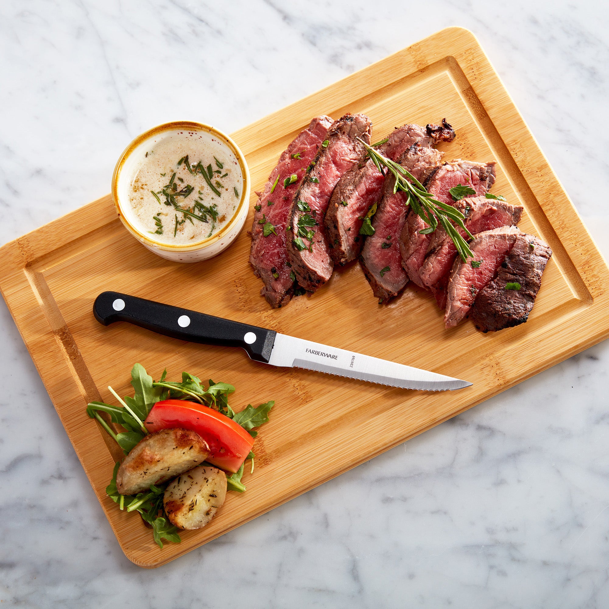 Farberware Stamped Triple Rivet High Carbon Stainless Steel Steak Knife Set, 4-Piece, Black
