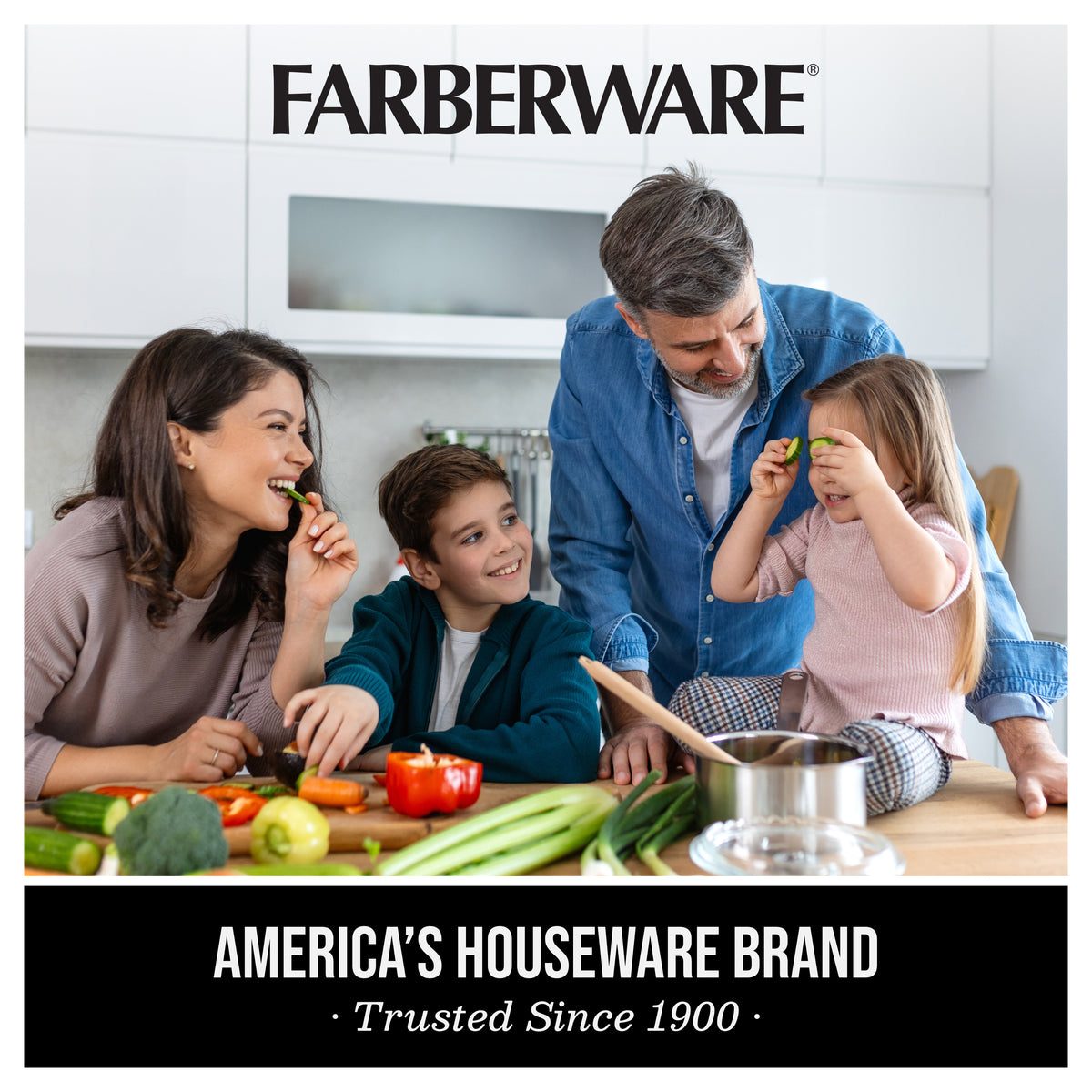 Family gathered in a kitchen around a large cheese board with fruits vegetables and herbs